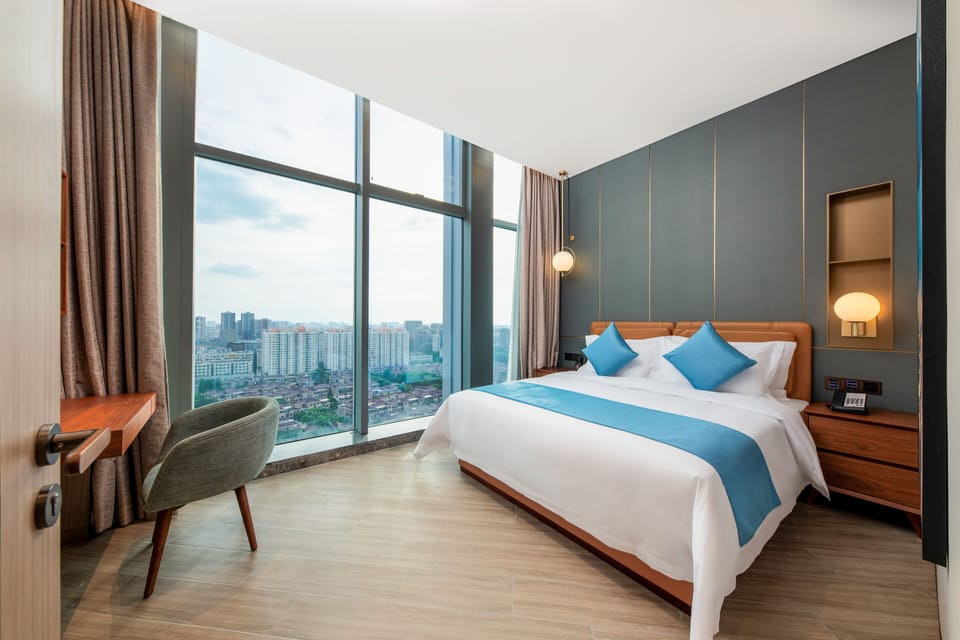 Two-Bedroom View Suite | Down comforters, minibar, in-room safe, desk