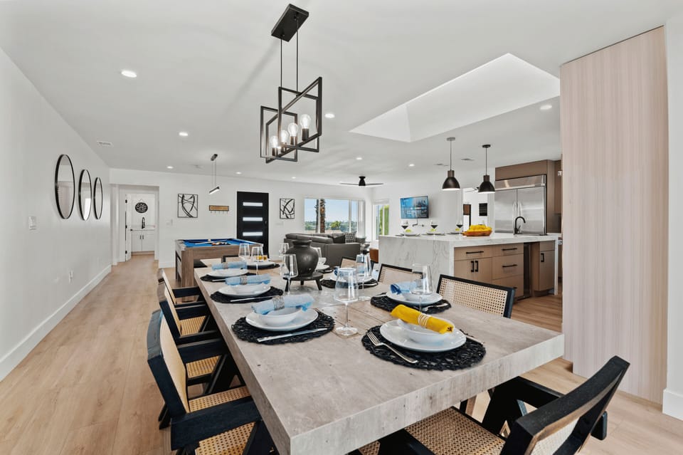 The feast begins around this beautiful 8 seat dining table