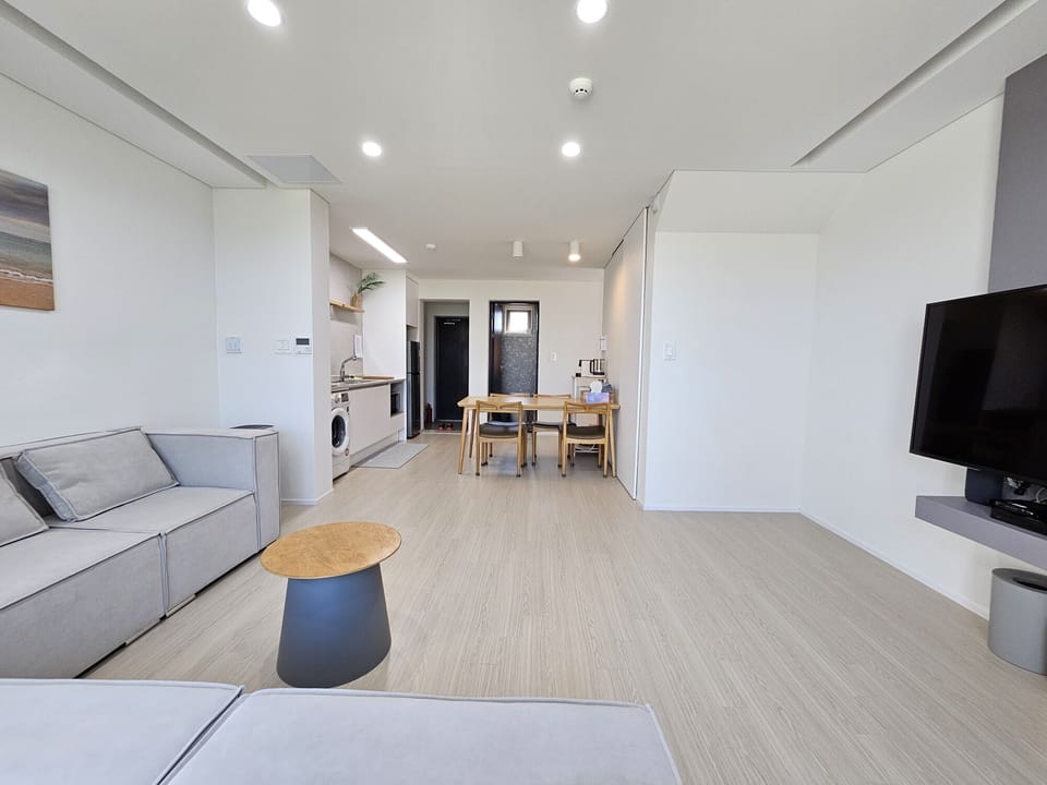 35pyeong deluxe duplex | Living area | 60-inch LED TV with cable channels