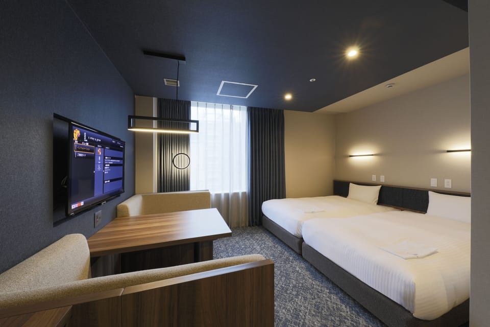 Basic Twin Room | In-room safe, desk, blackout drapes, iron/ironing board