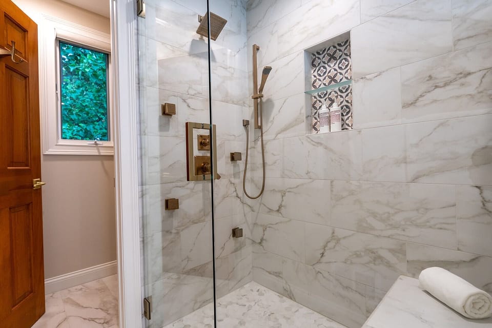 Upper-Level Bathroom with Rain Shower