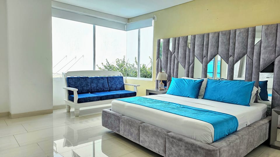 Junior Suite | 1 bedroom, premium bedding, minibar, in-room safe