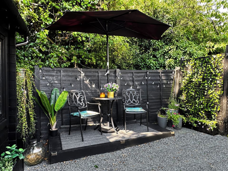 Private Courtyard with raised decking and seating