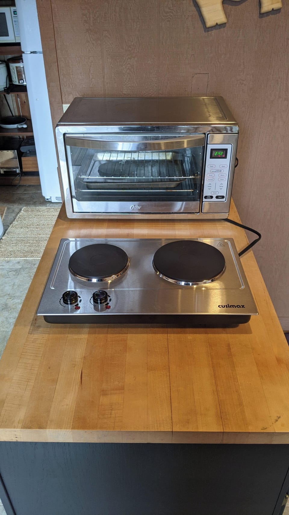 Kitchenette has a 2 burner hot plate, full size fridge, etc.