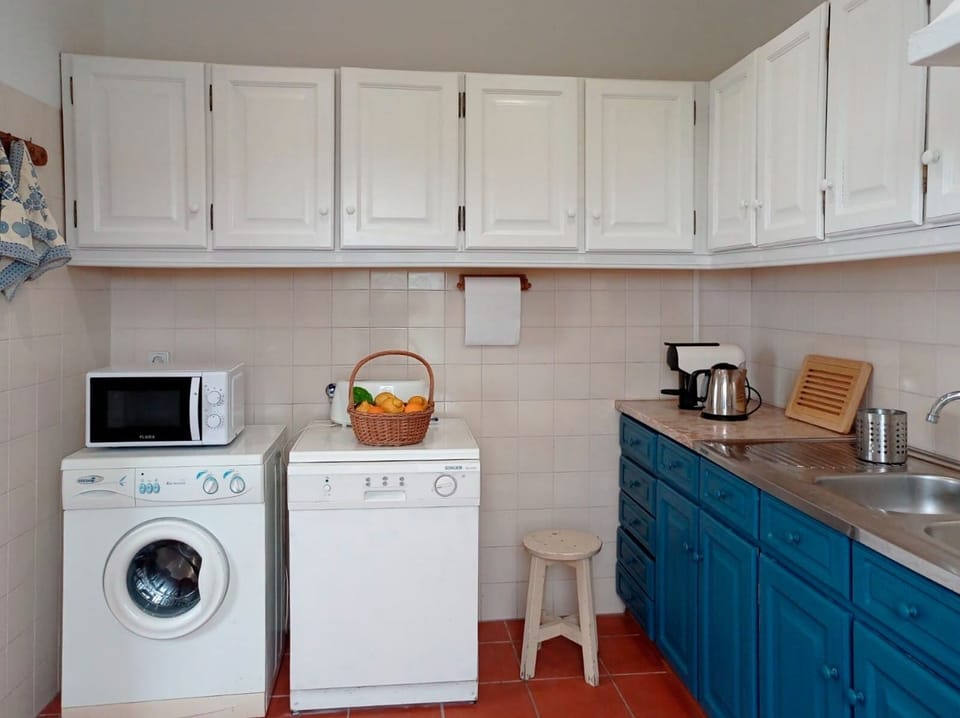 kitchen with laundry machine and dish machine