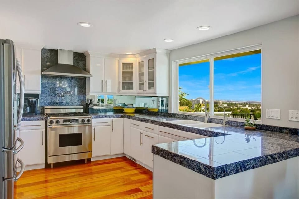 Kitchen is equipped with stainless steel appliances