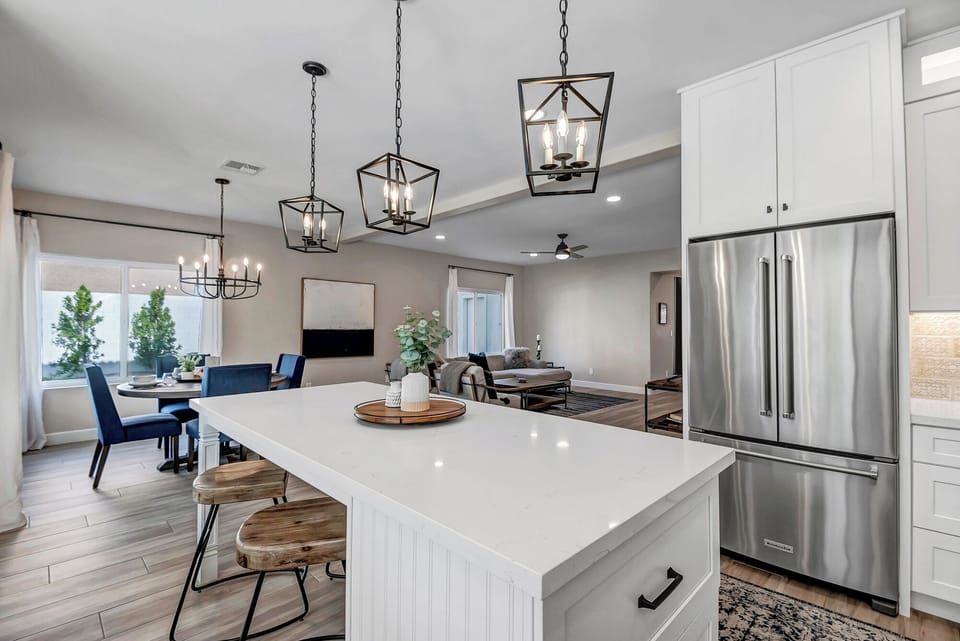 Fully Equipped Kitchen with Stainless Steel Appliances - Opens Up into the Dining Area