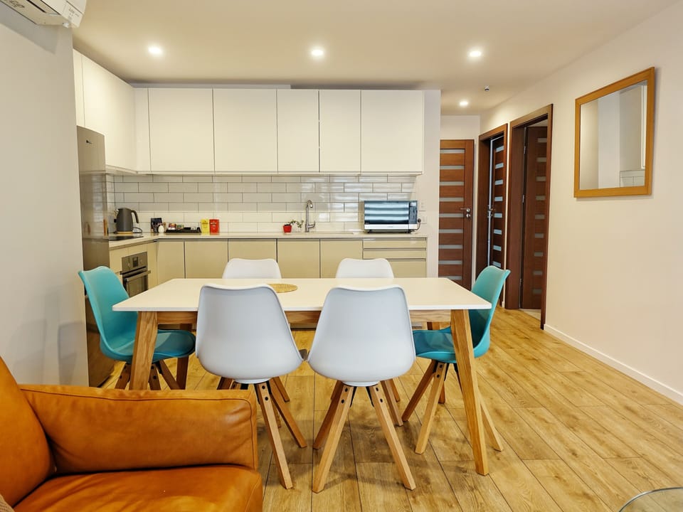 Comfort Apartment | Living area | 38-inch TV with cable channels