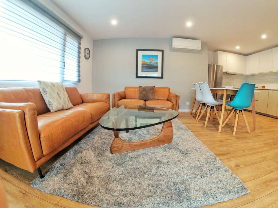 Comfort Apartment | Living area | 38-inch TV with cable channels