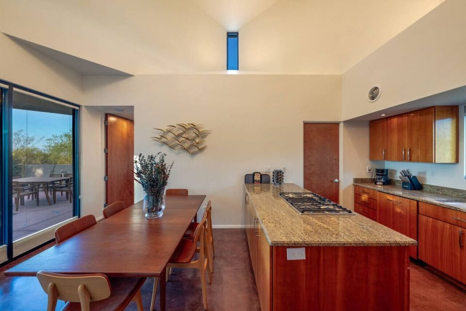 Fully equipped chef`s kitchen with granite countertops and custom cabinets