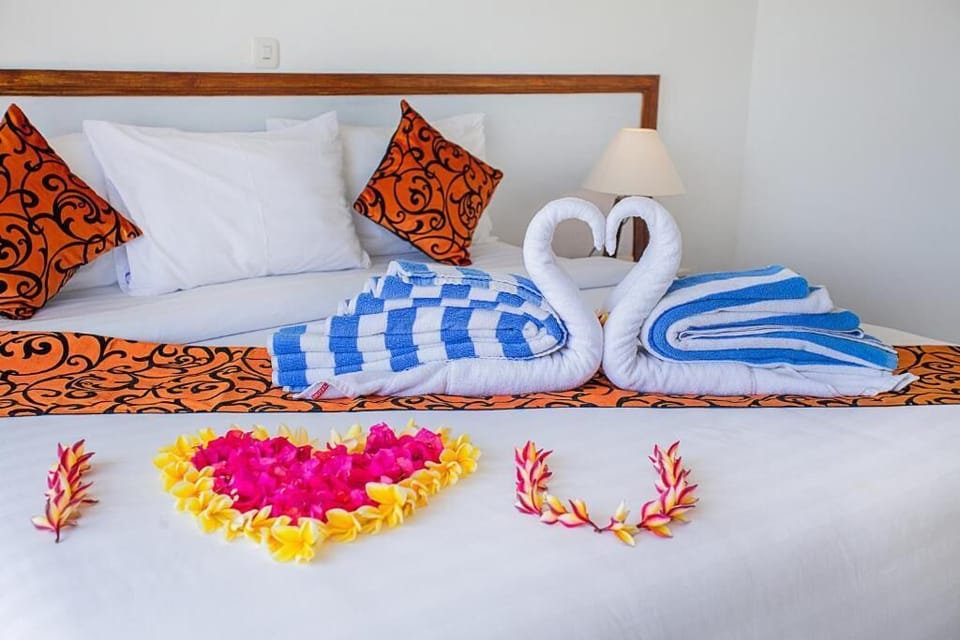 Egyptian cotton sheets, premium bedding, minibar, in-room safe