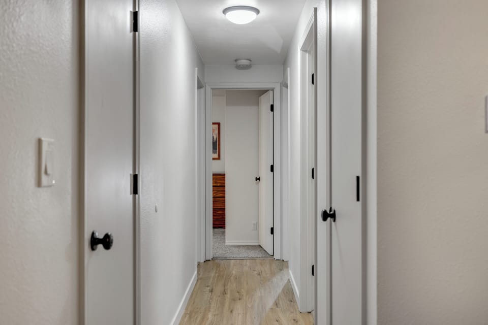 Hallway to bedrooms and bathroom