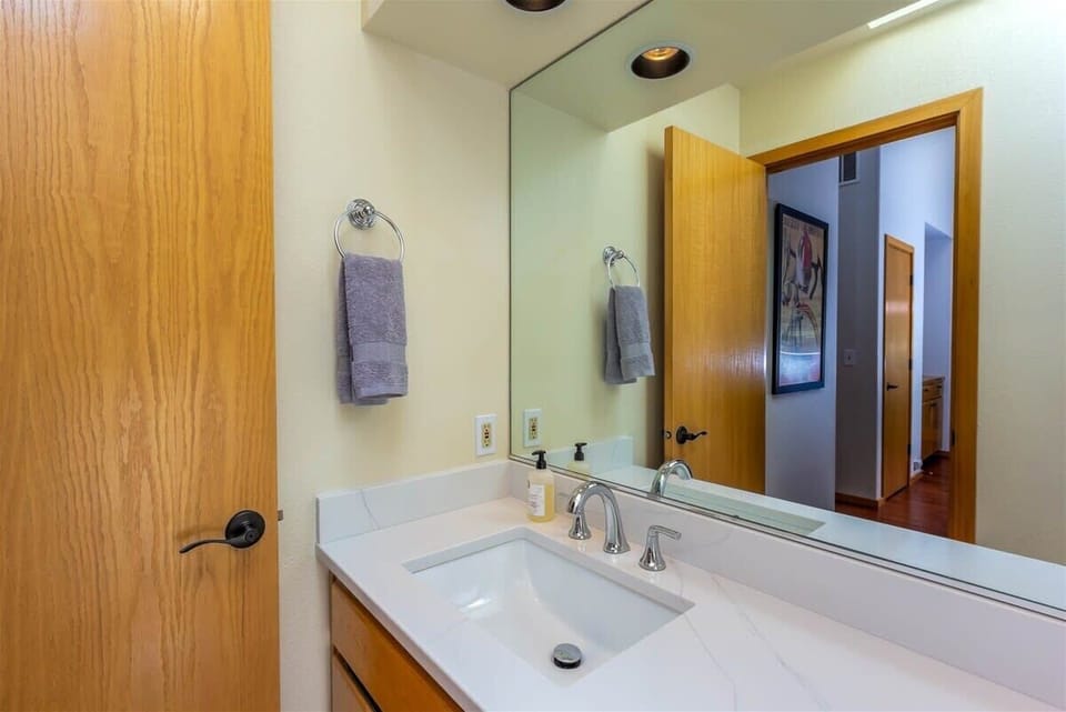 1/2 bathroom is located just off the main living area.