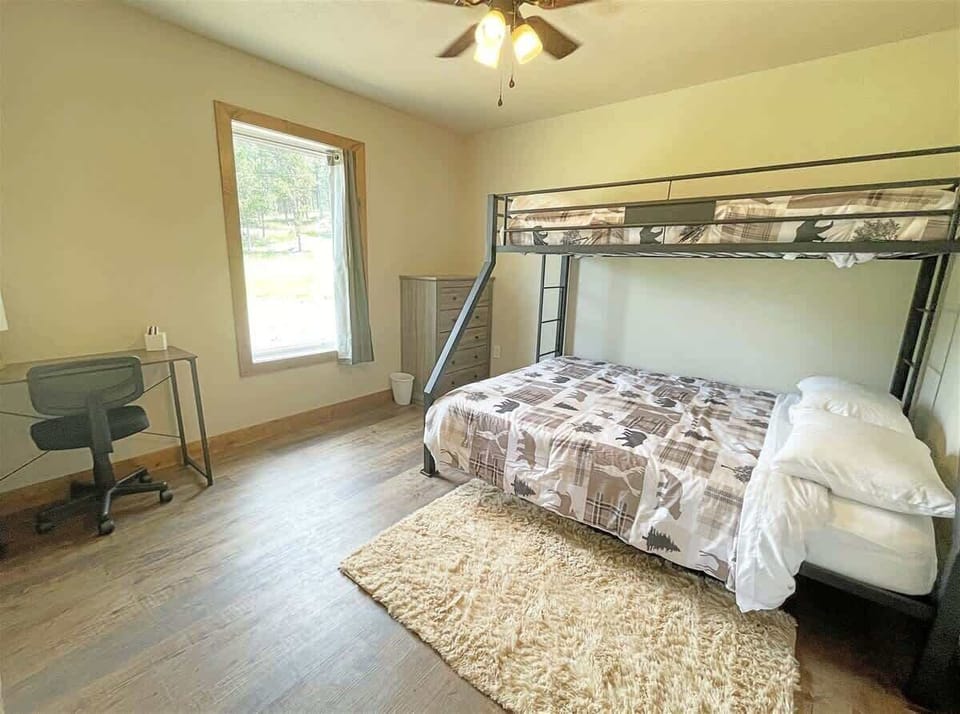 Second bedroom with a queen bottom bunk and XL twin top 