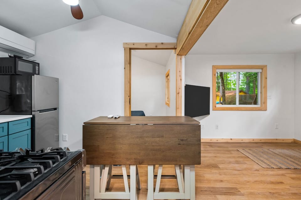 Modern design meets functionality with bright spaces and nature views right outside!