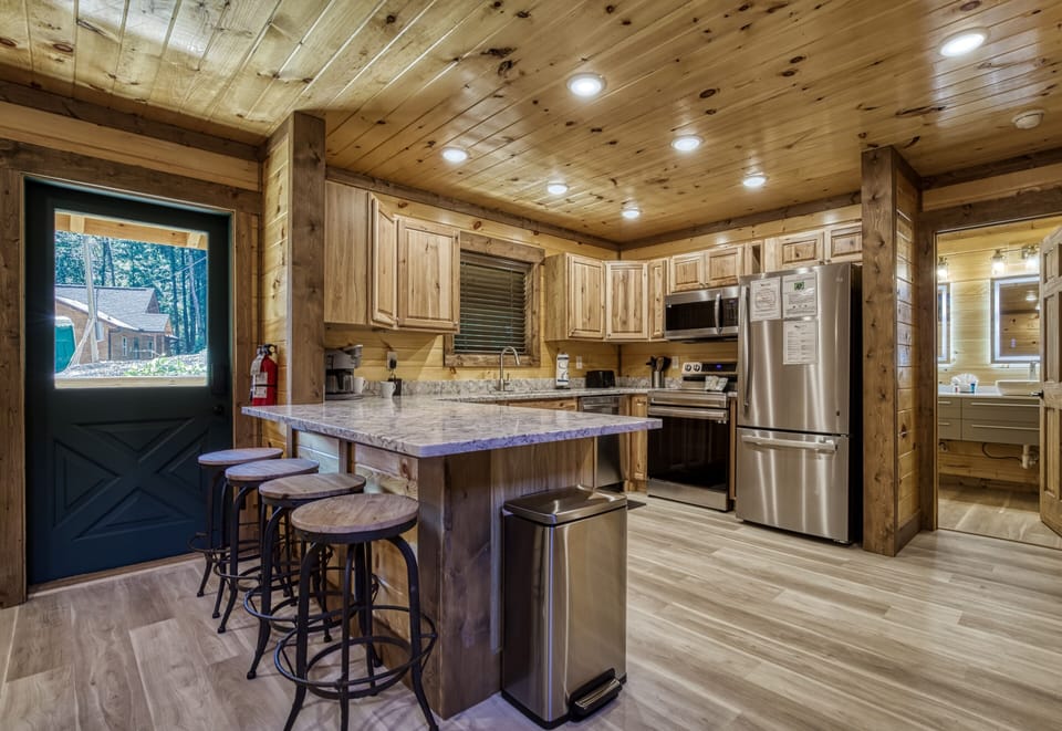 View of kitchen and island/bar - View of kitchen and island/bar