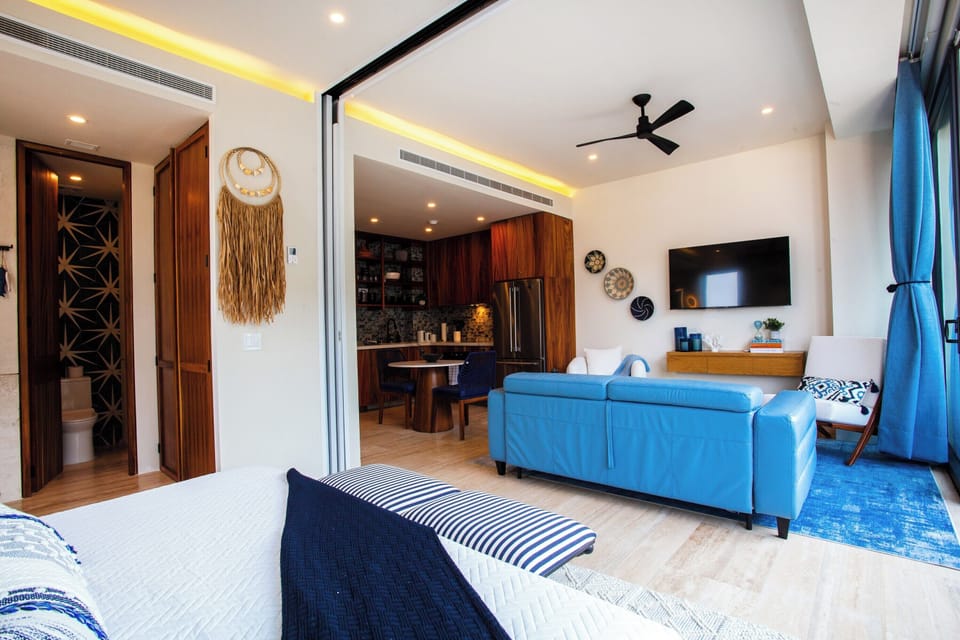 You can watch the TV from the sofa or the comfort of your bed