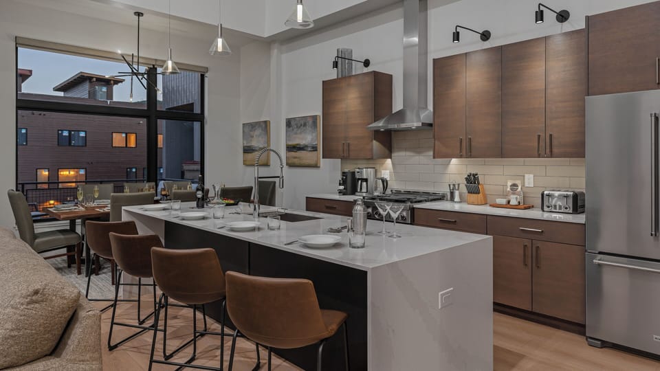 Kitchen, Main Level - Kitchen with breakfast bar seating