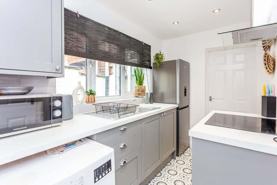 Family-friendly kitchen oasis equipped with all essentials, including a washer & dryer, oven, fridge and full cookware set. Plus, thoughtful touches like children's dinnerware ensure everyone feels right at home in this cozy culinary haven.

