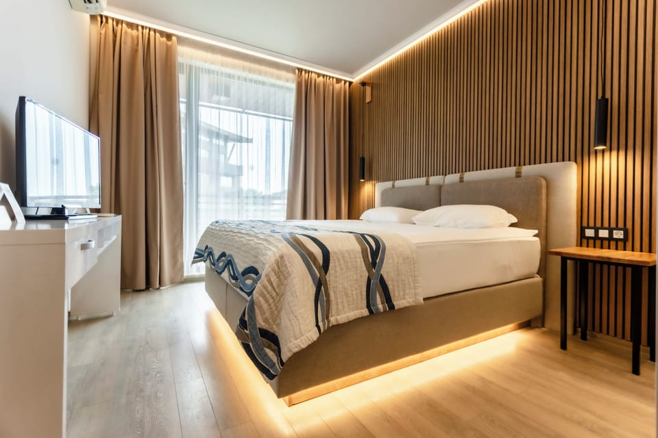 Apartment, 1 Bedroom | Minibar, in-room safe, soundproofing, free WiFi