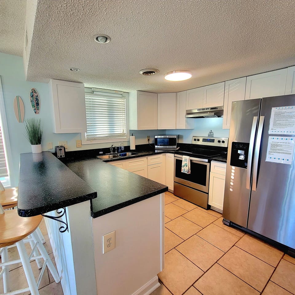 Updated kitchen with ocean views from the window. 
