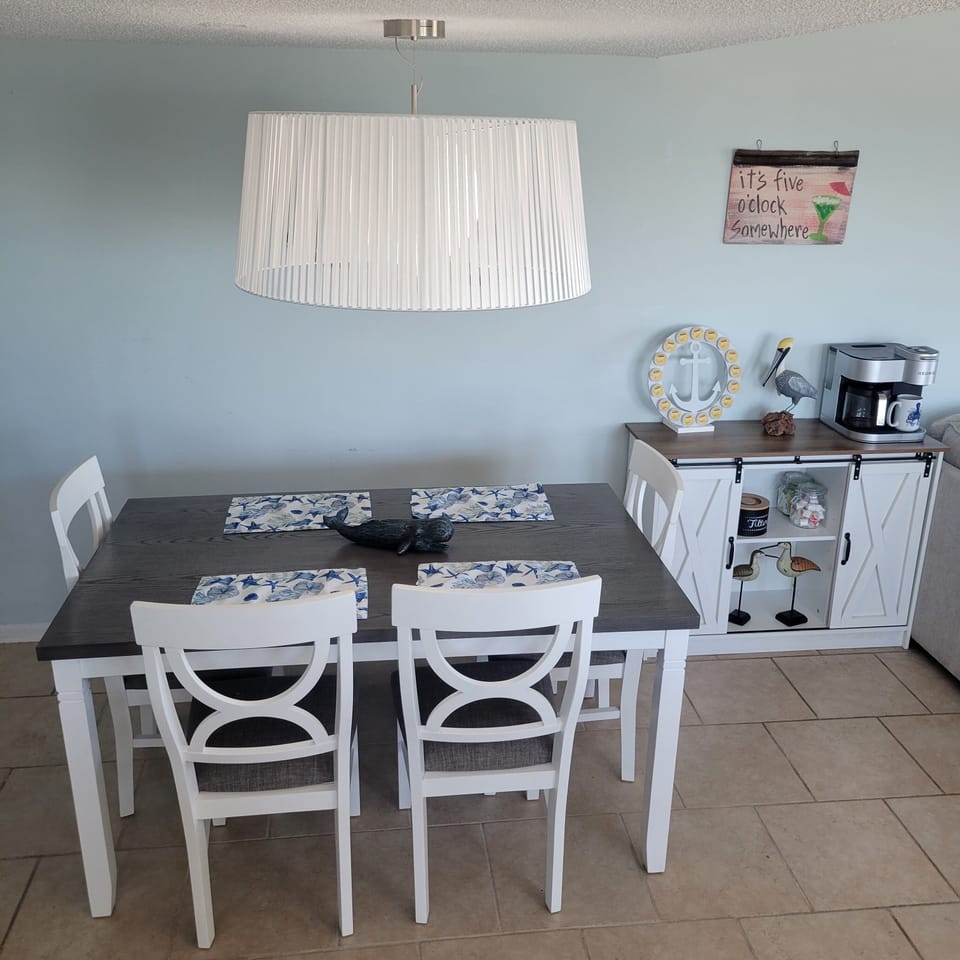 Seating for 6 with 4 chairs and a bench seat. 