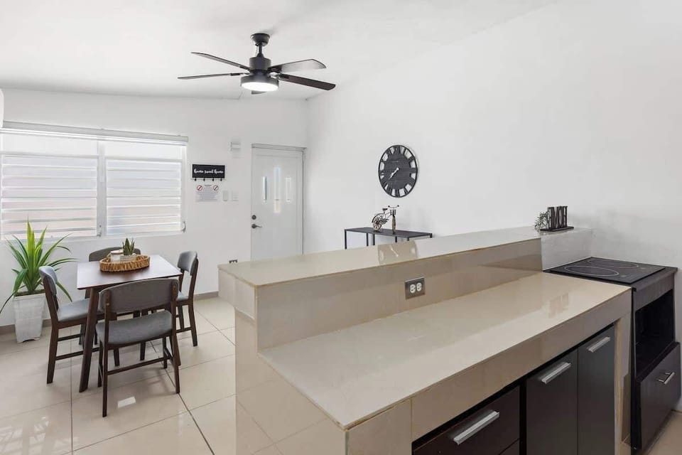 A beautiful, clean space with elegant kitchen counters.