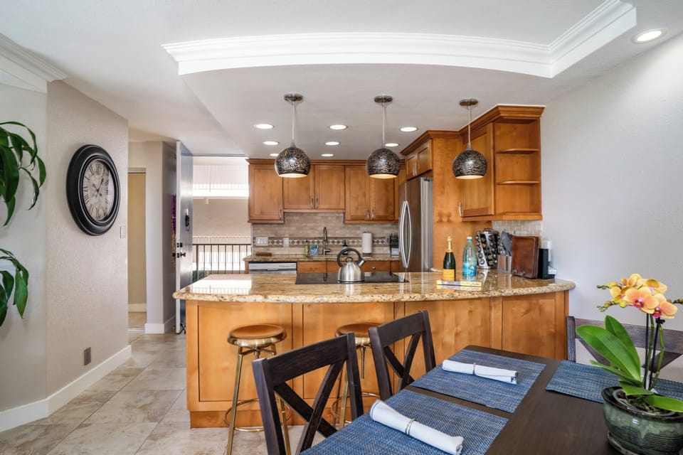 Luxury Condo | Private kitchen | Full-size fridge, microwave, oven, stovetop