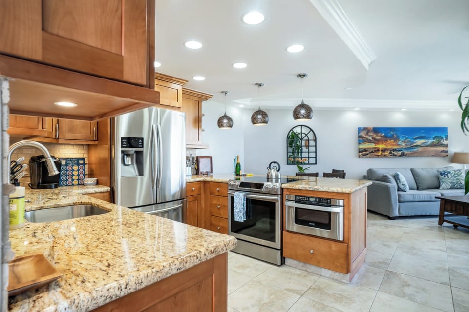 Luxury Condo | Private kitchen | Full-size fridge, microwave, oven, stovetop