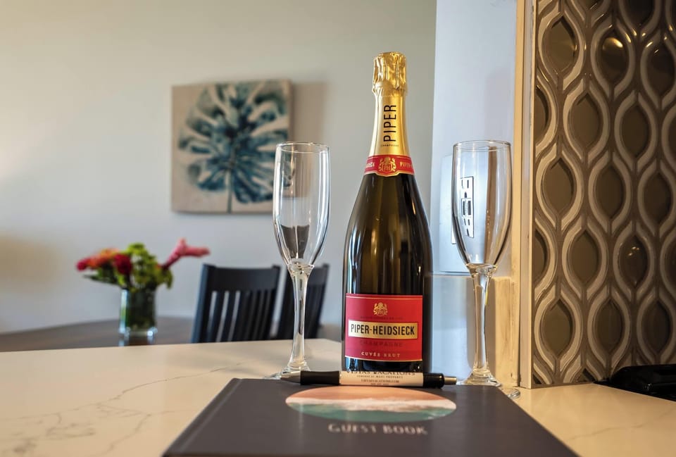 Luxury Condo | Private kitchen | Full-size fridge, microwave, oven, stovetop