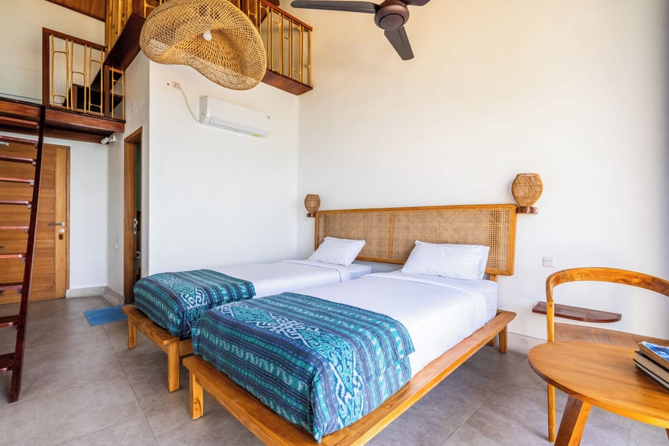 Deluxe Room, Multiple Beds, Sea View | 1 bedroom, in-room safe, laptop workspace, free WiFi