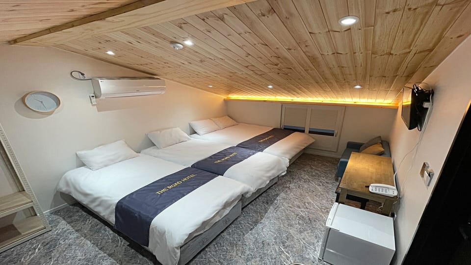 Basic Quadruple Room | Blackout drapes, soundproofing, iron/ironing board, free WiFi