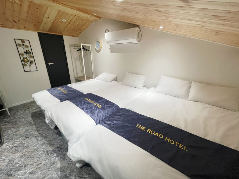 Basic Quadruple Room | Blackout drapes, soundproofing, iron/ironing board, free WiFi