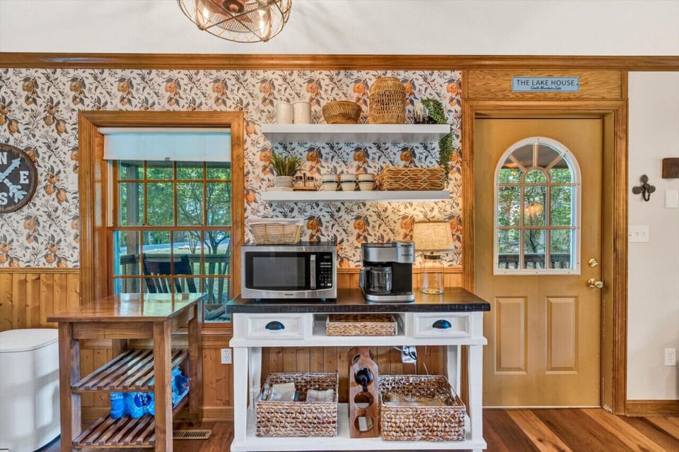 Efficiently designed kitchen with smart storage solutions in a charming, compact space.
