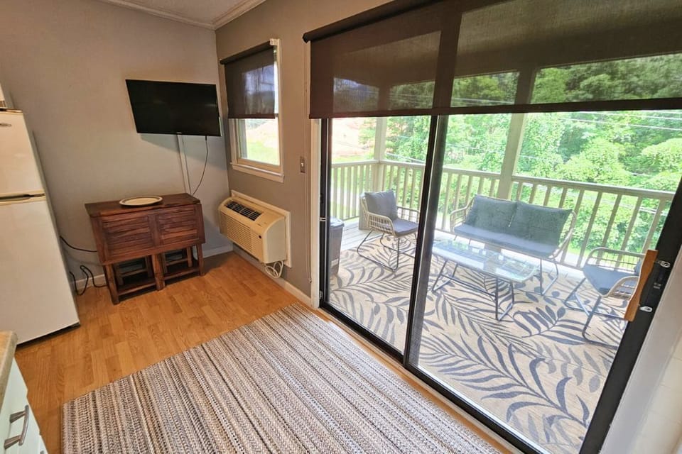 A beautiful back porch - with cozy patio furniture