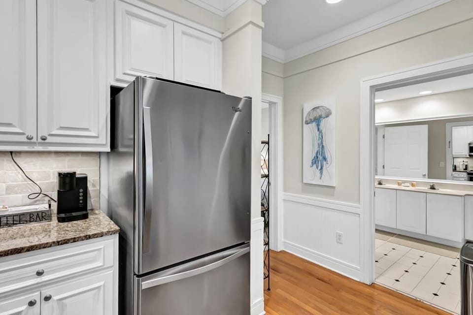107 Grand Pavilion Kitchen into 1st Floor Bedroom
