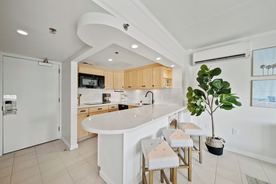 Kitchen Counter with 3 Bar Stools