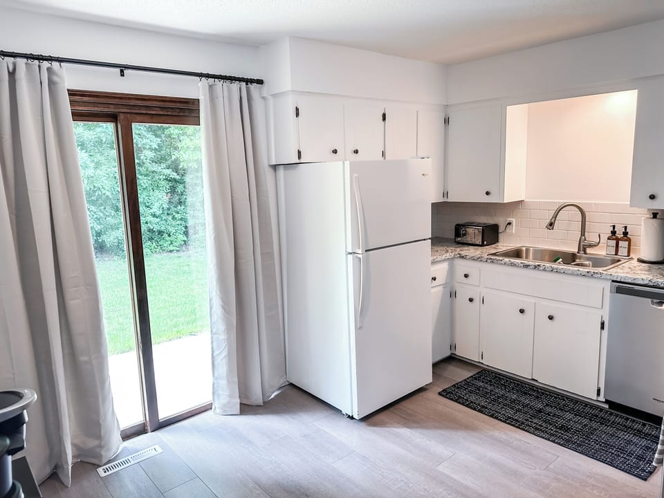 You'll Appreciate the Sun-Drenched Kitchen when Preparing Your Meals