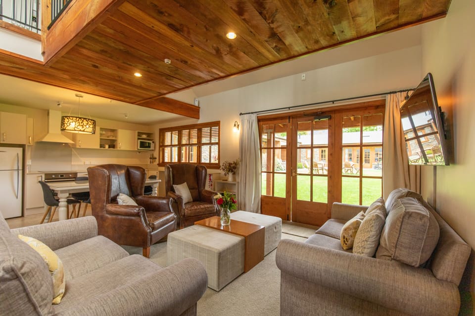 Lismore Cottage | Living area | Flat-screen TV, toys