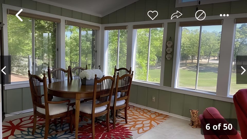 Upstairs Sunroom overlooking golf course.  Access to both upstairs decks.