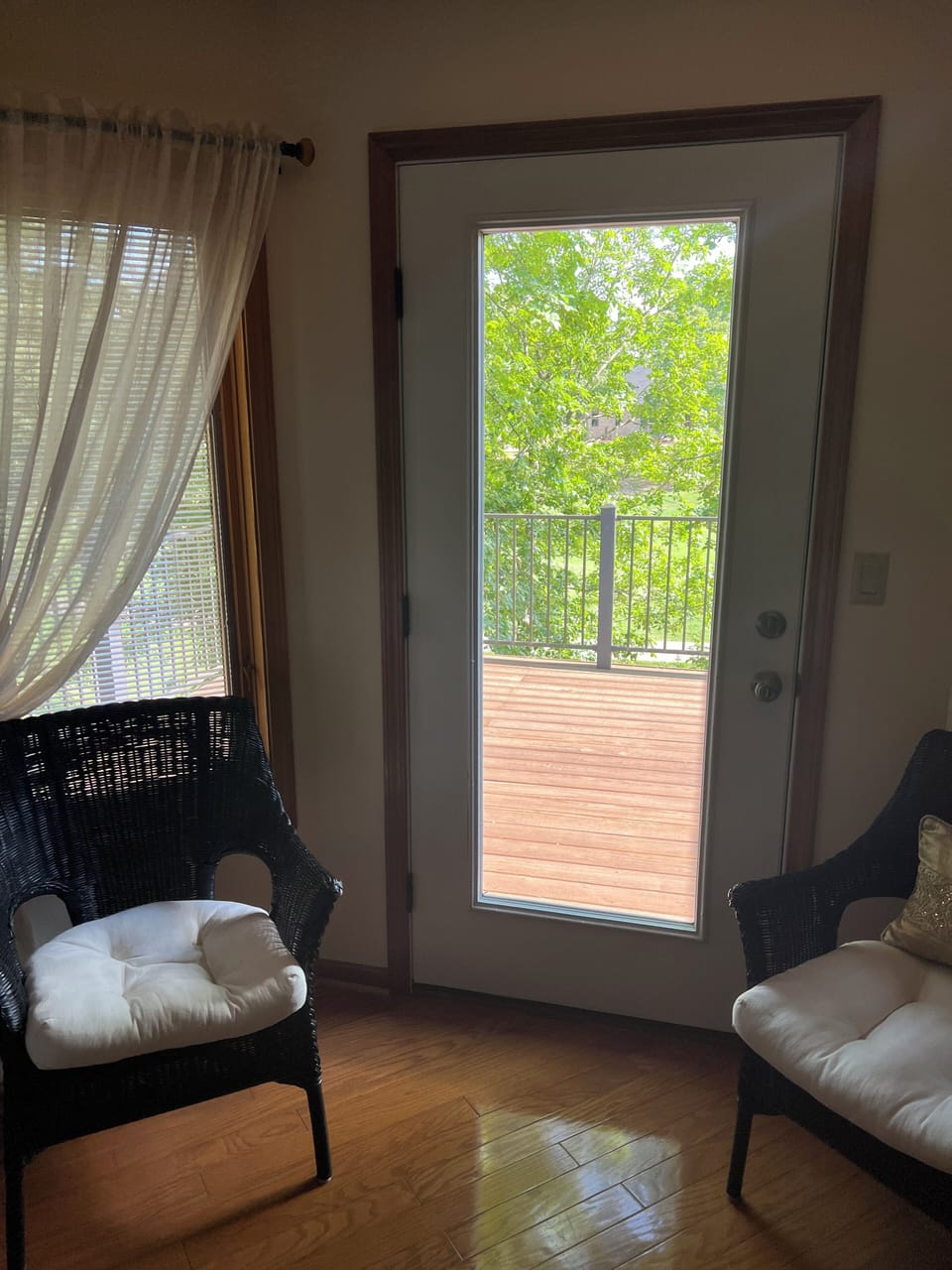 Door to one of the decks from inside the upstairs Master Bedroom.
