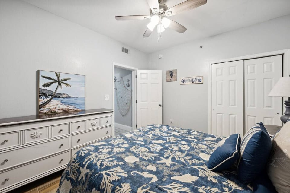 Bedroom with Queen Size Bed and Flat Screen TV