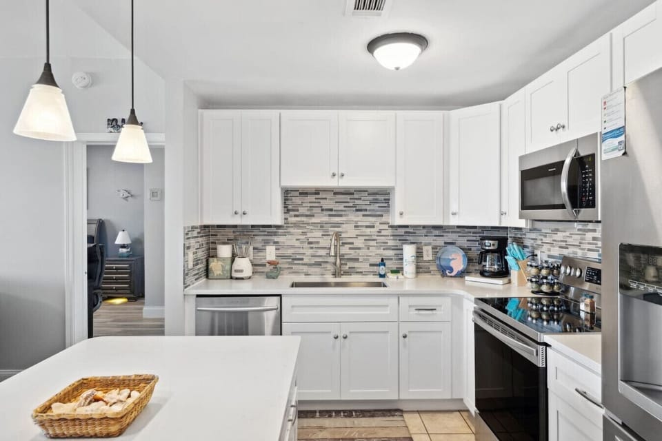Full Size Kitchen with Ocean Views and Island Bar Seating