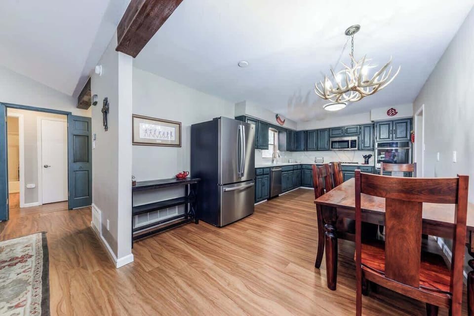 Fully equipped kitchen with stainless appliances — perfect for home-cooked meals.
