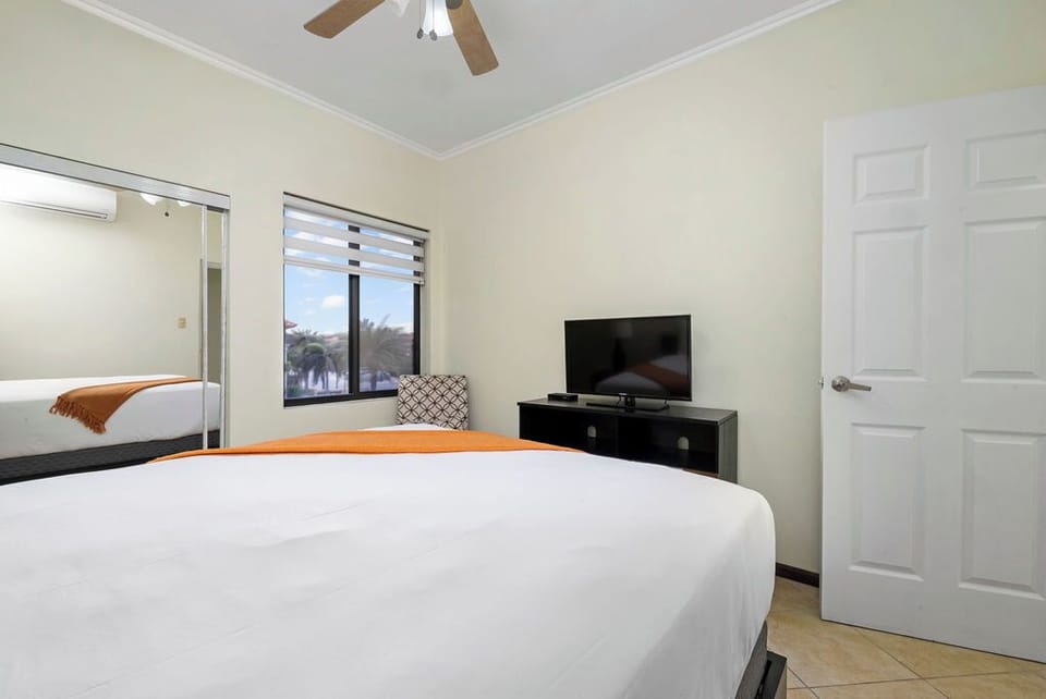 Sink into plush comfort and drift into dreamland in our bedroom.