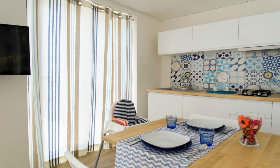 Family Bungalow, 2 Bedrooms | Private kitchenette | Full-size fridge, stovetop, cookware/dishes/utensils