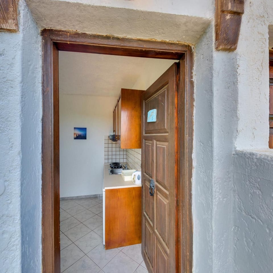 Fridge, electric kettle, cookware/dishes/utensils