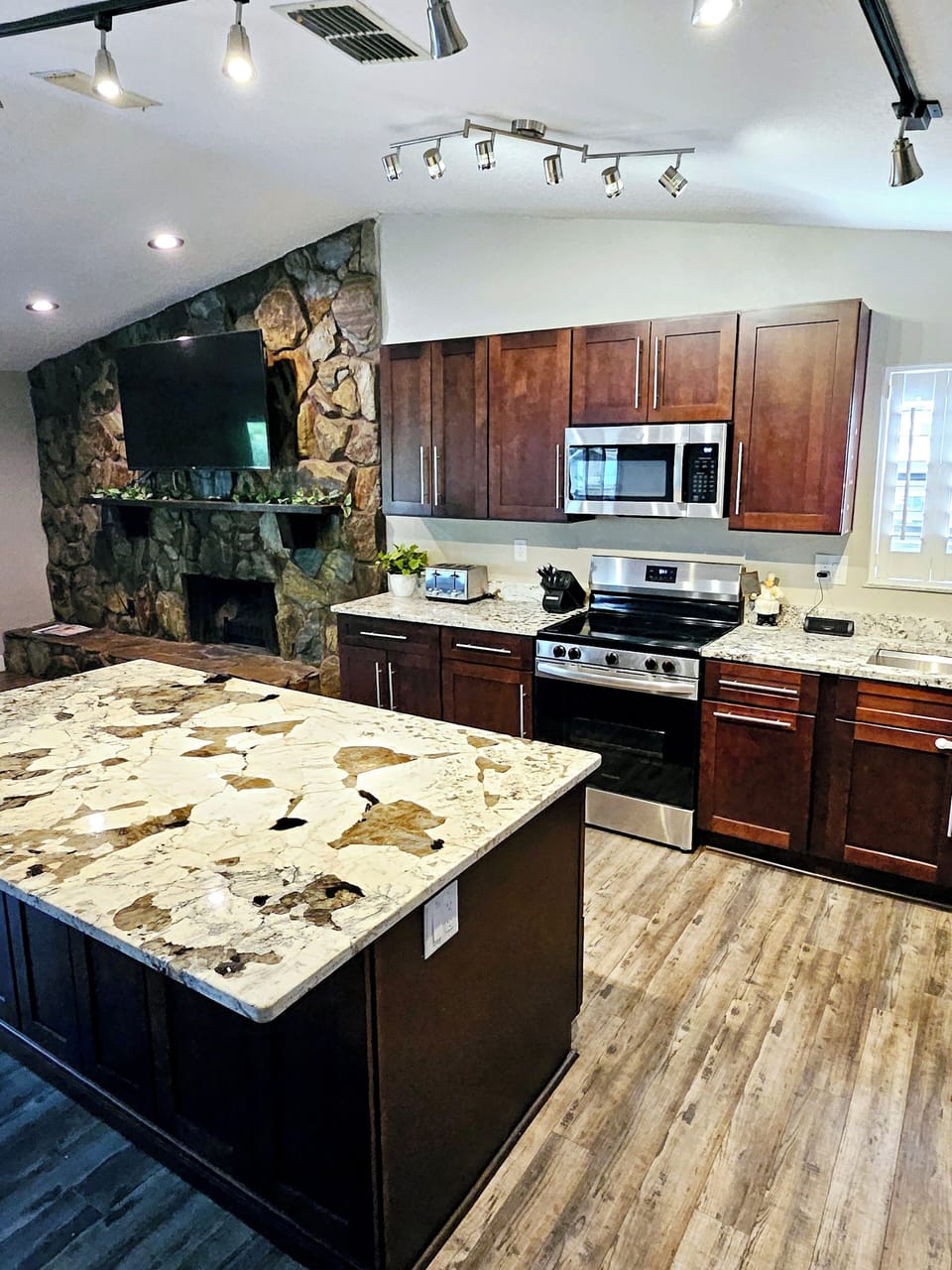 Large kitchen and Island for Eating and Prepping food