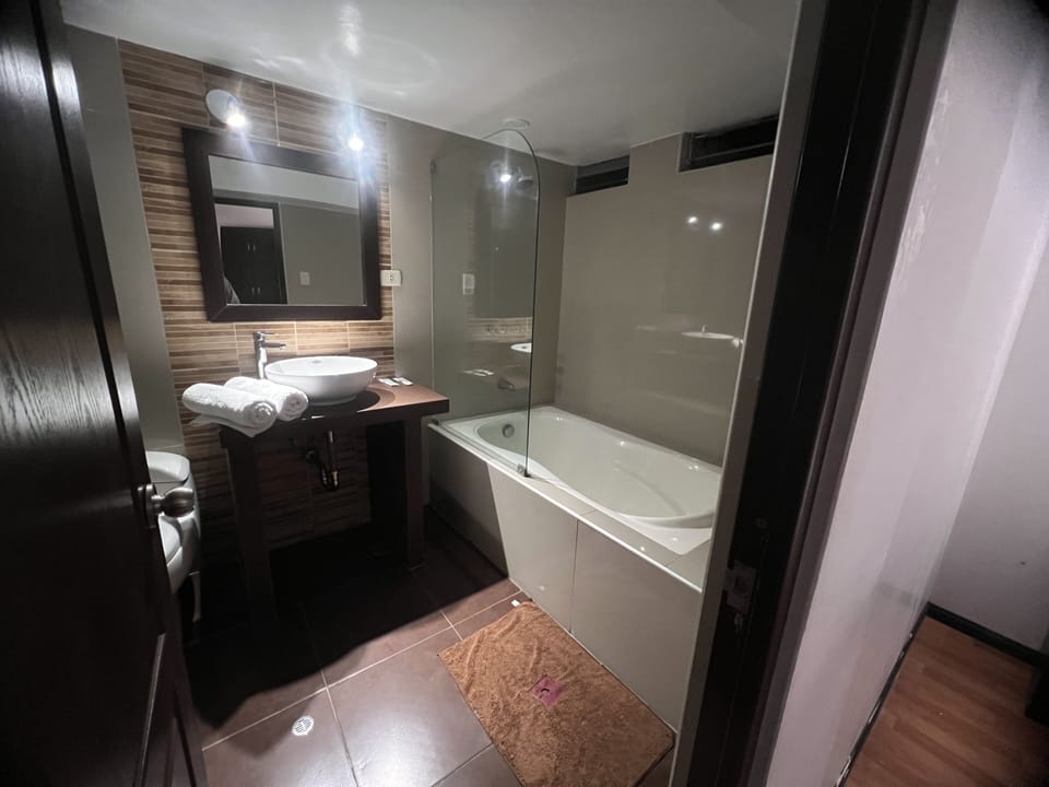 Superior Room | Bathroom | Rainfall showerhead, hair dryer, towels, soap