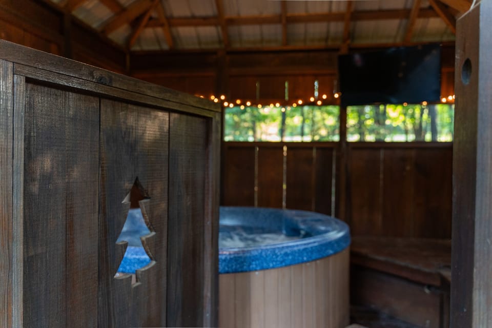 Enjoy total seclusion and relaxation in the outdoor hot tub room. Catch up on your current binge show or turn on the weekend game while you're at it!